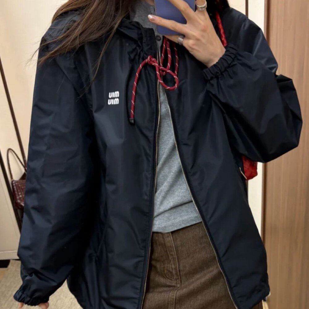 MIUMIU windbreaker, exquisitely tailored with a hood